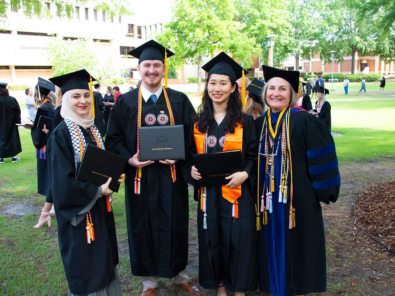 a group of people posing for the camera