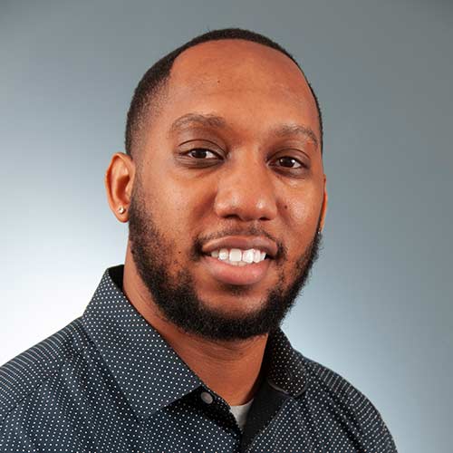 a man smiling for the camera