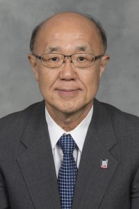a man wearing a suit and tie