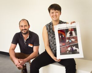 Faculty member Will Fenn (left) and high school student Harmony Koda (right) pose for a photo to kick off the Imagination Station art exhibit.