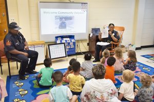 Chief Mitchell reads to the children in the ELC.