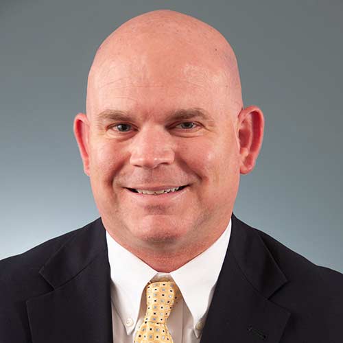 a man wearing a suit and tie