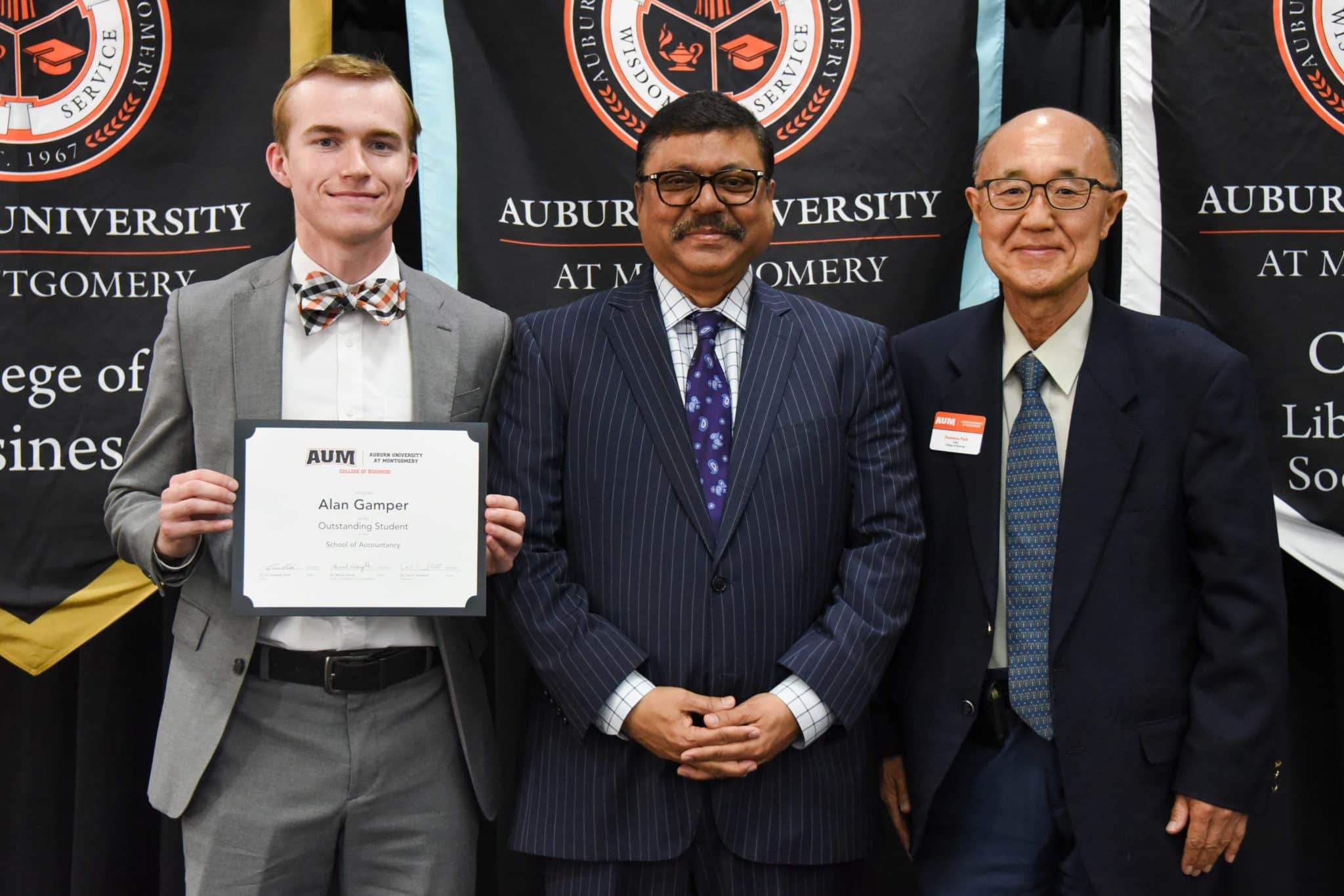 Alan Gamper receives Outstanding Student award at Auburn University at Montgomery event.