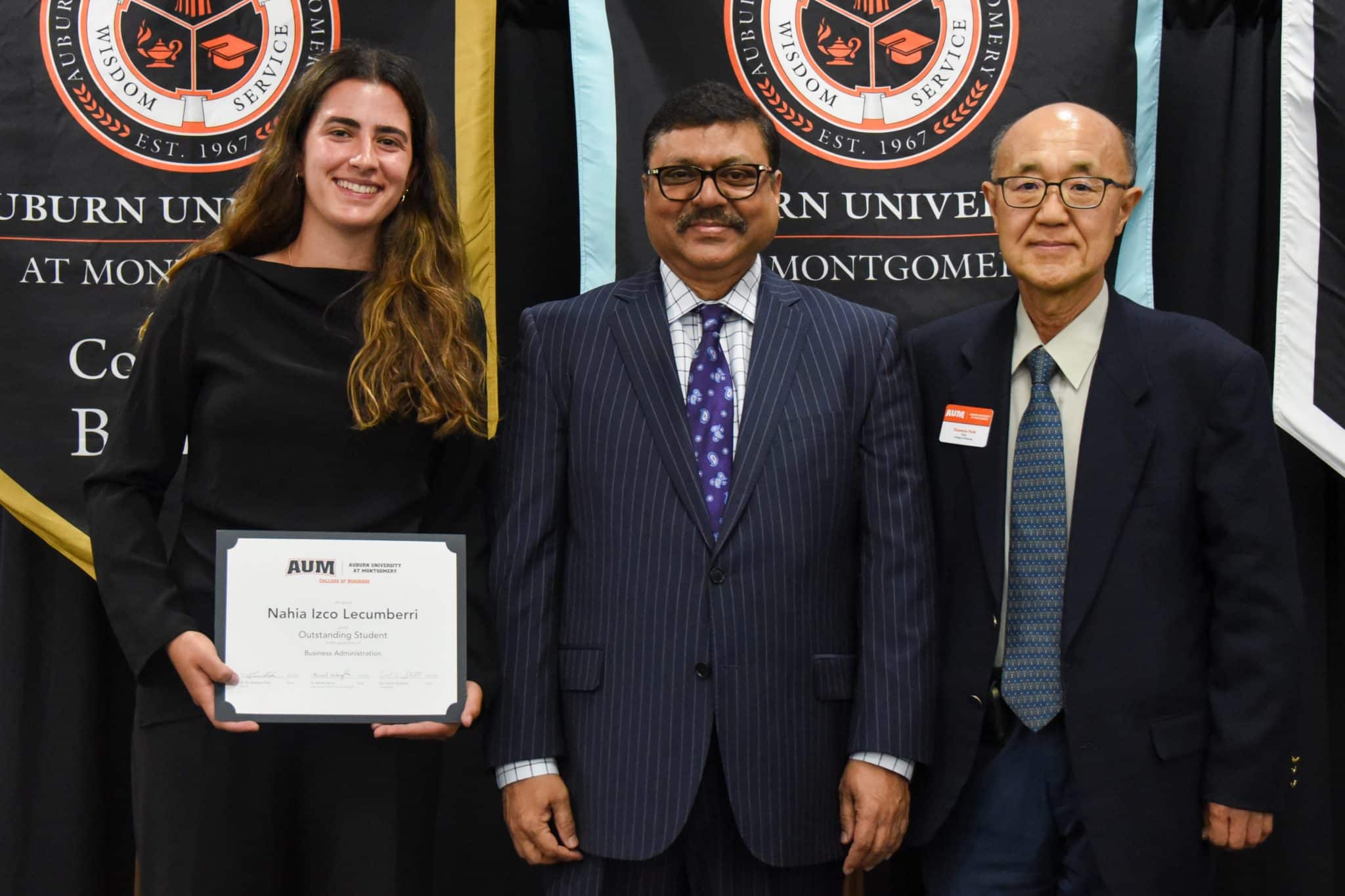 Nahia Izco Lecumberri receives an Outstanding Student award at Auburn University at Montgomery ceremony.
