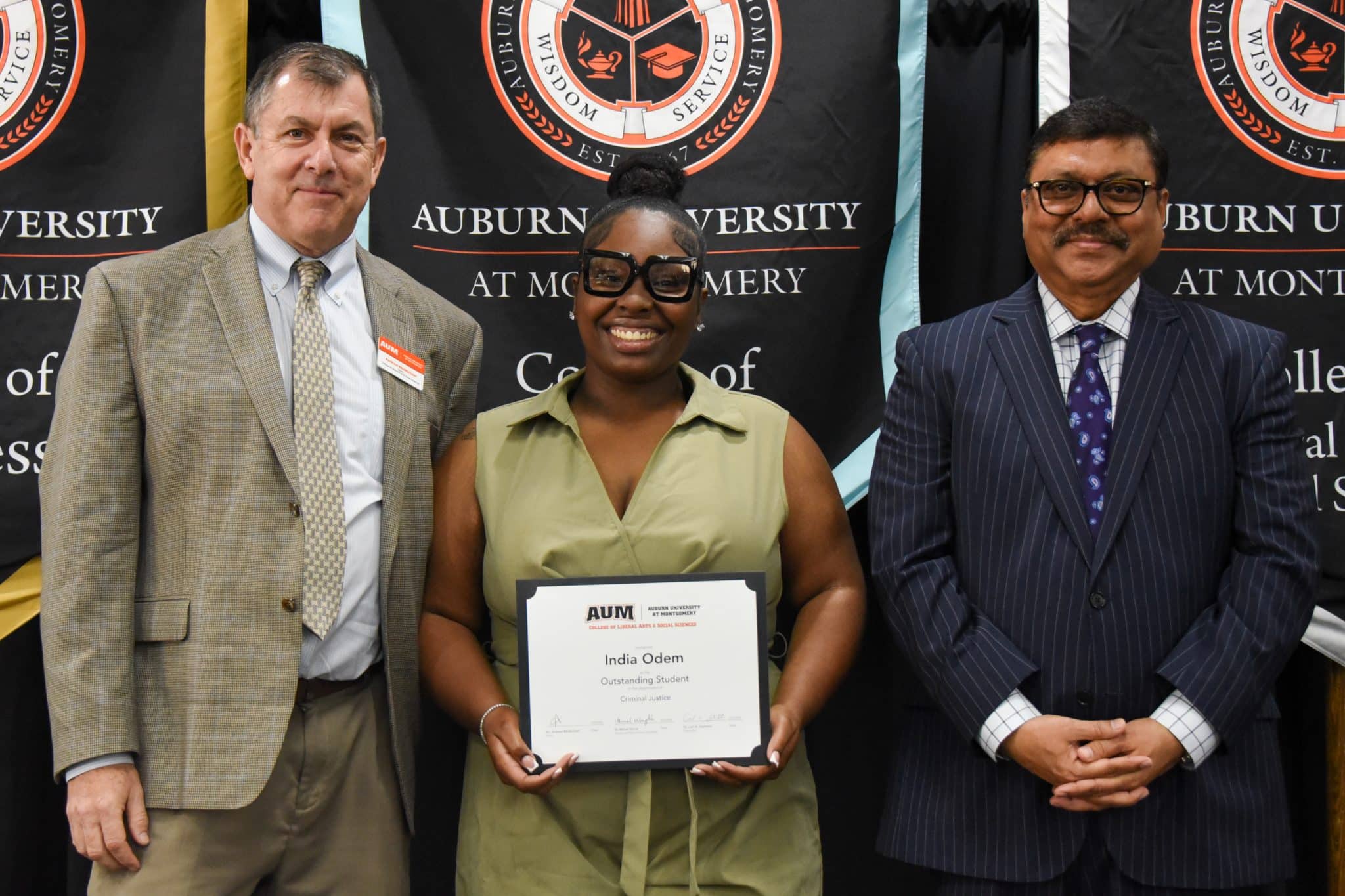 India Odem receiving an Outstanding Student award at Auburn University at Montgomery ceremony.