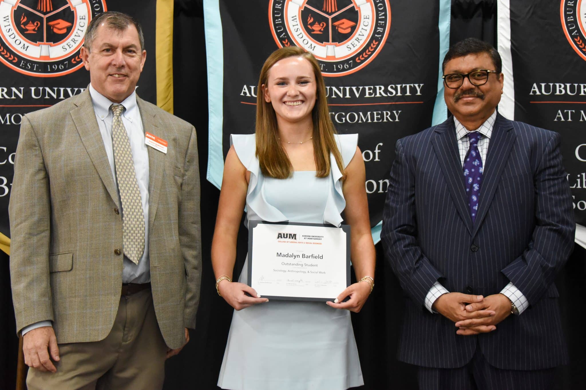 Madalyn Barfield receiving Outstanding Student award at Auburn University at Montgomery ceremony.