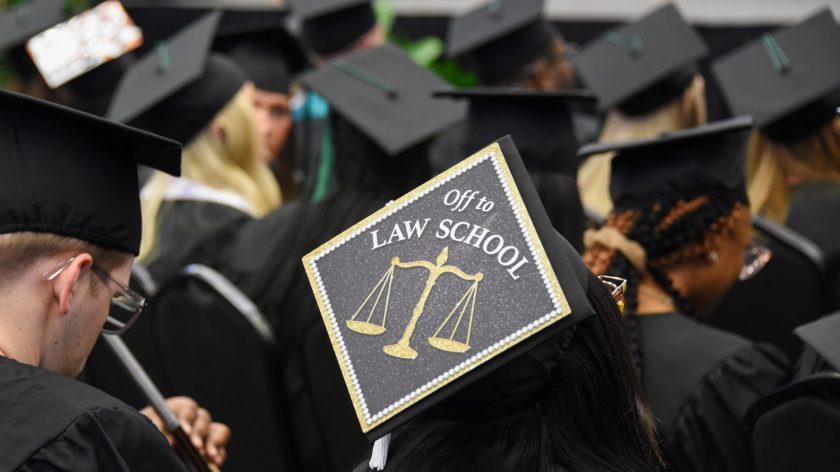 An Auburn University At Montgomery Student States Her Future Intention Of Attending Law School On Her Graduation Mortarboard.