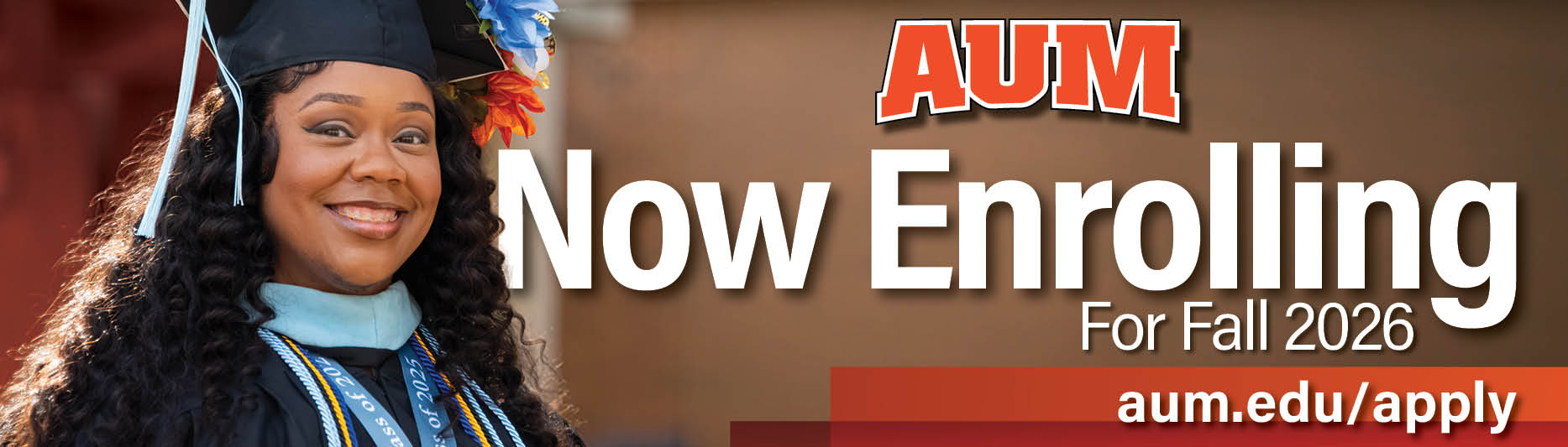 AUM Auburn University at Montgomery banner with a smiling graduate; Now Enrolling for Fall 2026. Apply at aum.edu/apply.
