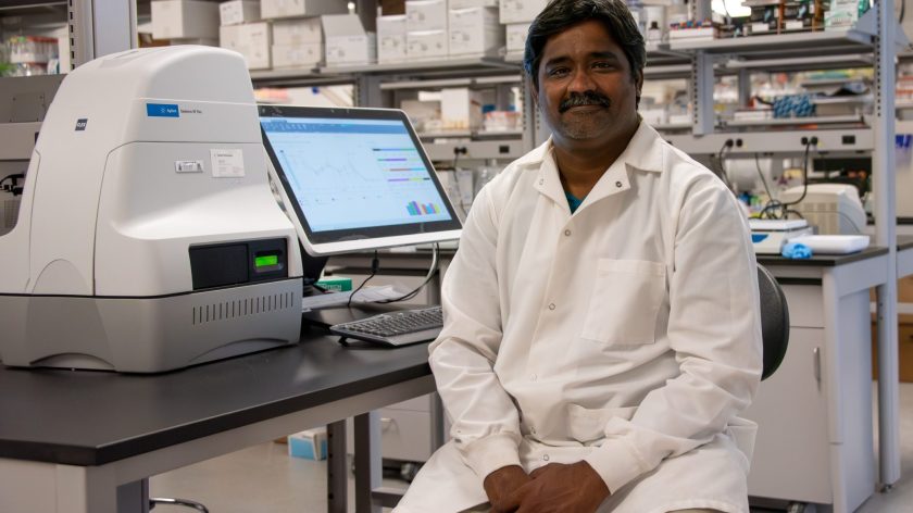 Siva Sakamuri, Assistant Professor Of Chemistry In Auburn University At Montgomery’s College Of Sciences, Stands Beside The Seahorse XFe24 Metabolic Flux Analyzer In His Laboratory In AUM’s Science And Technology Complex. The Instrument, Acquired Through A National Institutes Of Health Grant, Will Support Research Into How Cellular Energy Production Influences Brain Health, Aging And Disease. Photo By Nicolette Parrish / AUM.