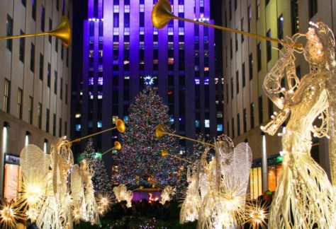 Auburn University at Montgomery holiday lights—angel sculptures with trumpets and a giant Christmas tree