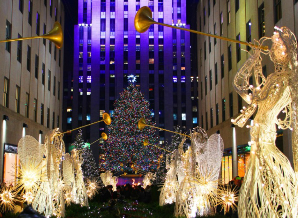 Auburn University at Montgomery holiday lights—angel sculptures with trumpets and a giant Christmas tree