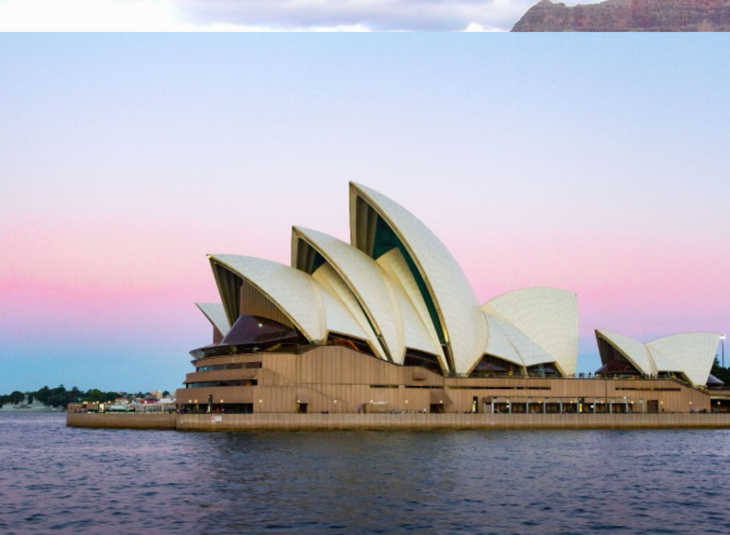 Auburn University at Montgomery study abroad - Sydney Opera House at dusk over Sydney Harbour, Australia.