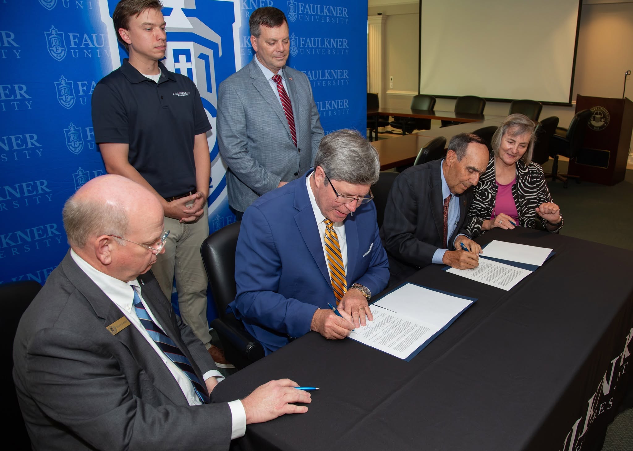 Auburn University at Montgomery and Faulkner University officials sign partnership agreement at campus ceremony
