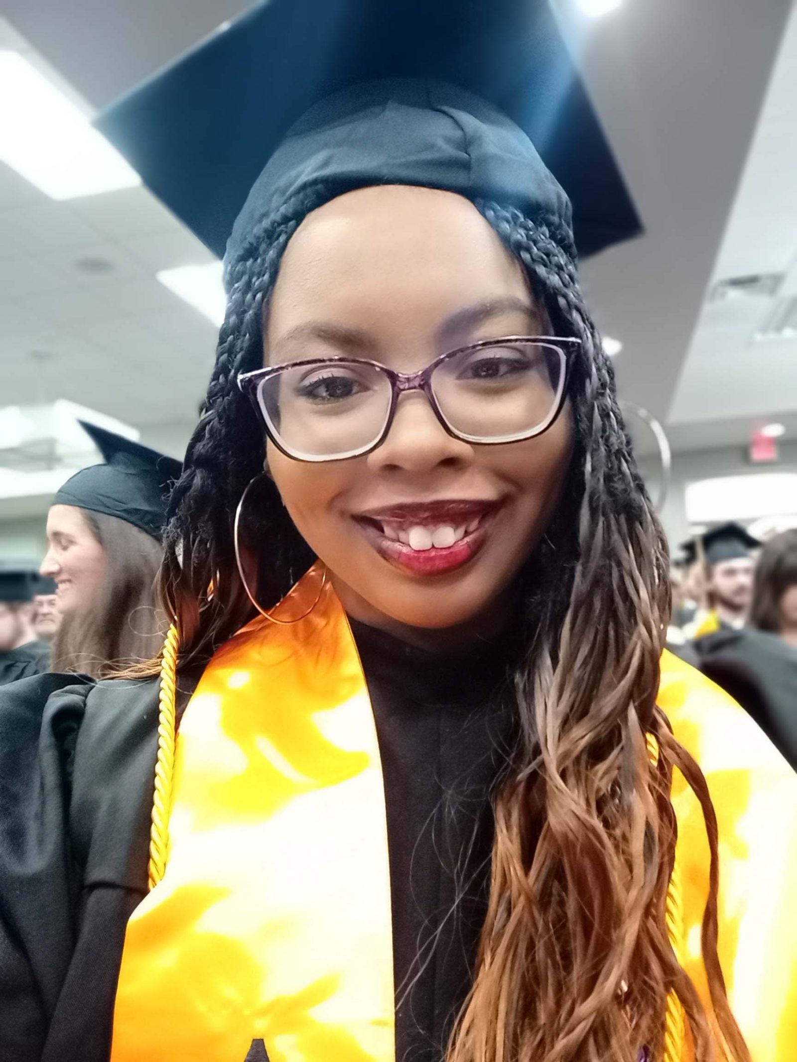 Spring 2026 graduate Arlyssea Thomas is founder of the AUM Guitar Club