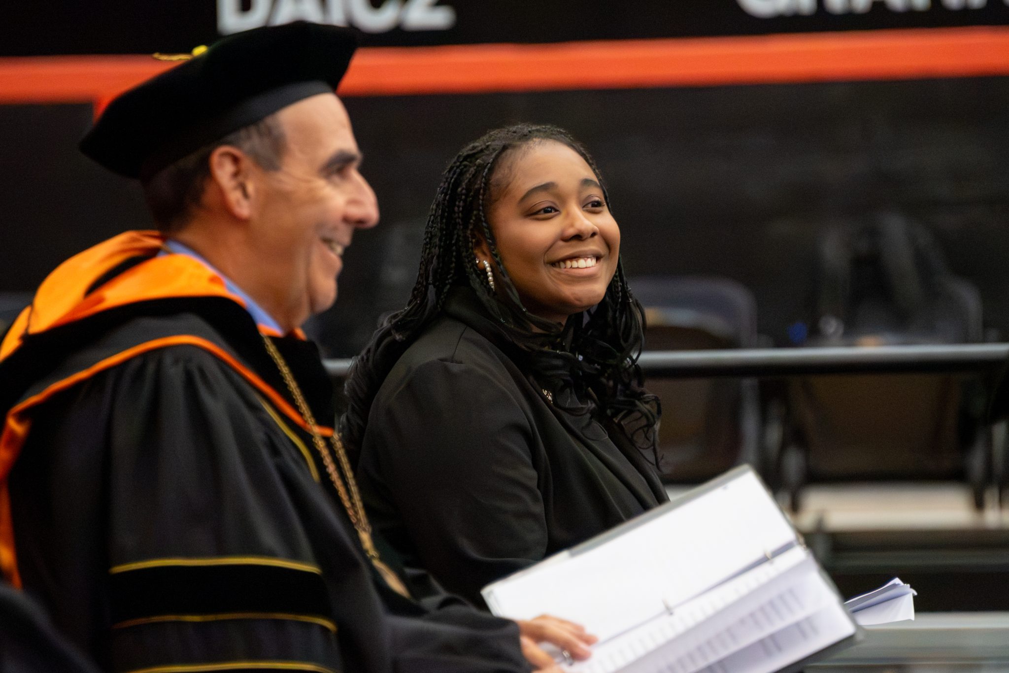 AUM SGA President, Tyreanna Causey smiles with Chancellor Carl Stockton at New Student Convocation.