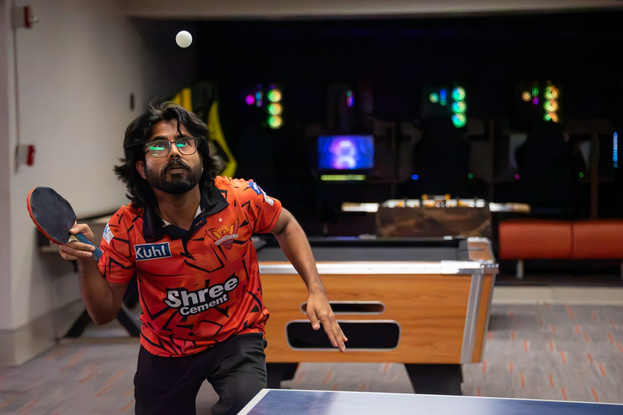 AUM student playing table tennis in campus game room at Auburn University at Montgomery