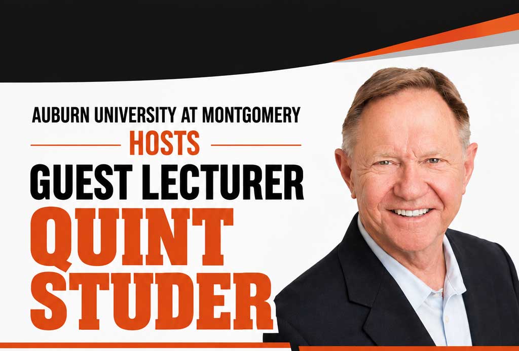 Auburn University at Montgomery hosts guest lecturer event; a smiling man in a suit on promotional banner.