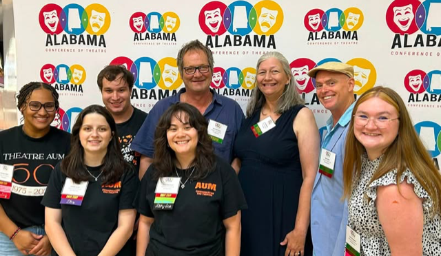 Auburn University at Montgomery theatre students and faculty at the Alabama Conference of Theatre backdrop