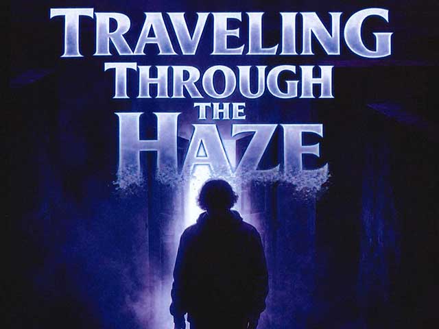 Auburn University at Montgomery poster: a person walks toward light under the blue title 'Traveling Through the Haze'.