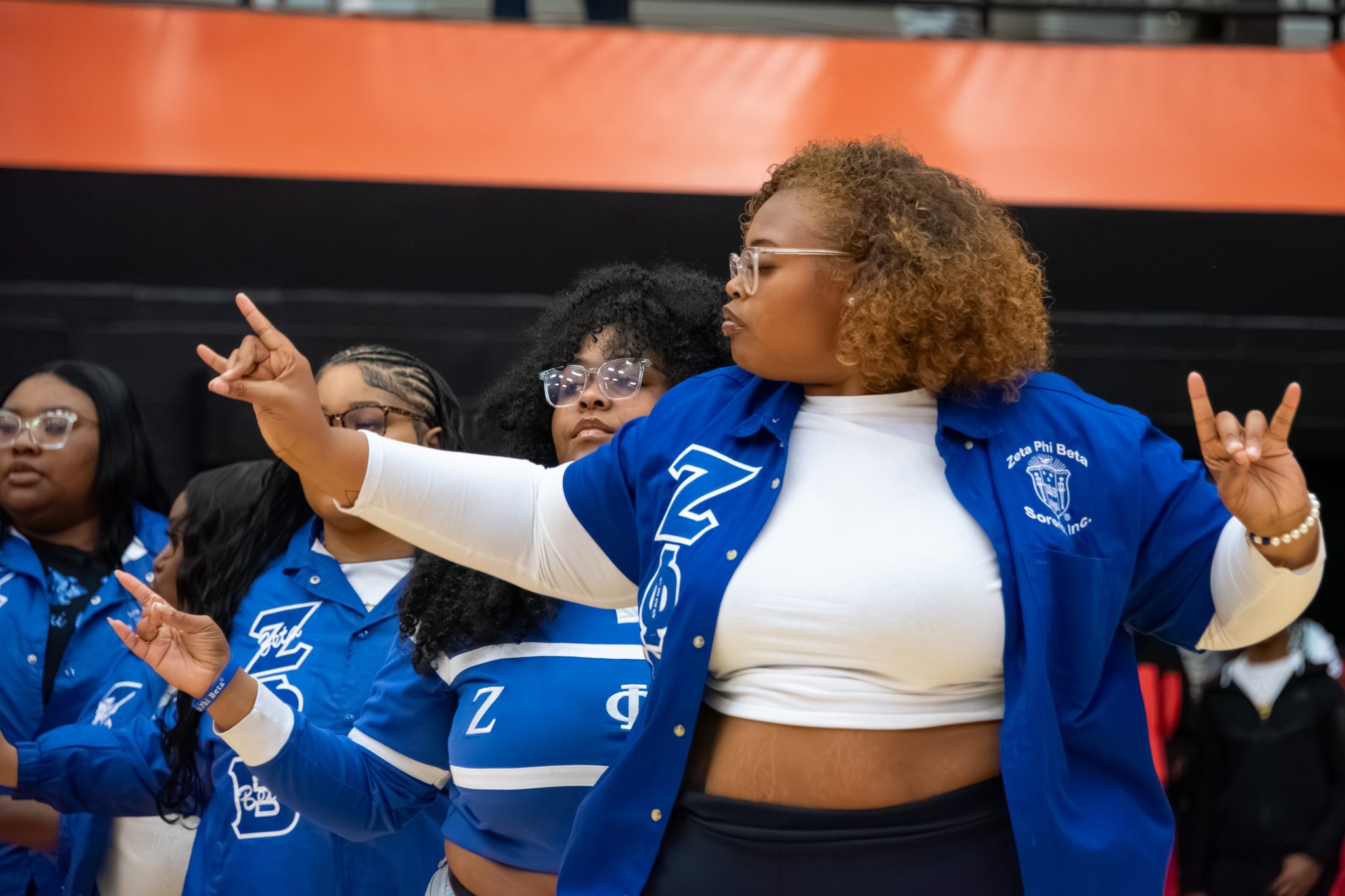 AUM Zeta Phi Beta sorority students perform a spirited step routine in the Auburn University at Montgomery gym.