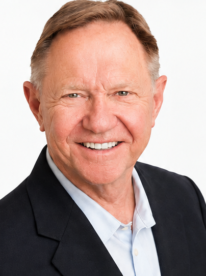 Auburn University at Montgomery professional headshot of a smiling man in a dark blazer on a white background.
