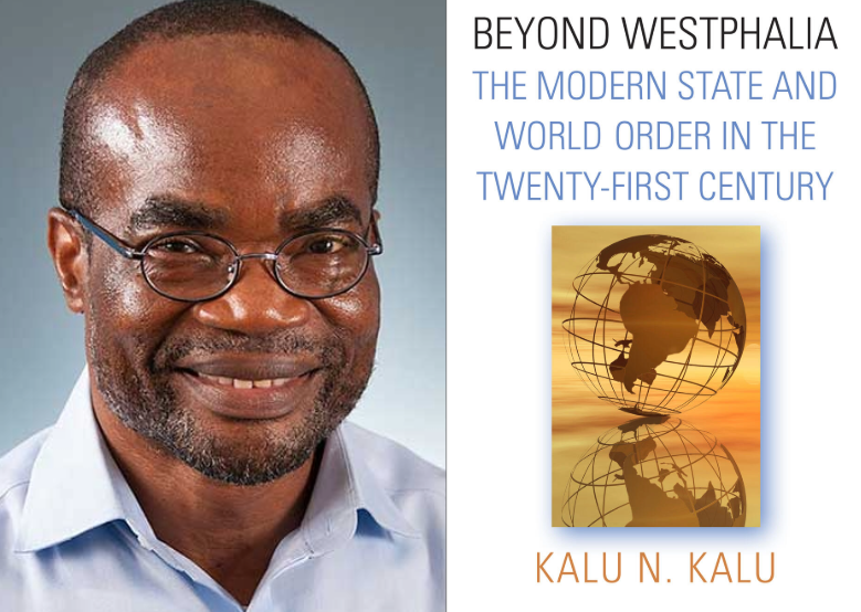 Auburn University at Montgomery: a man beside the book Beyond Westphalia—The Modern State and World Order with globe cover.