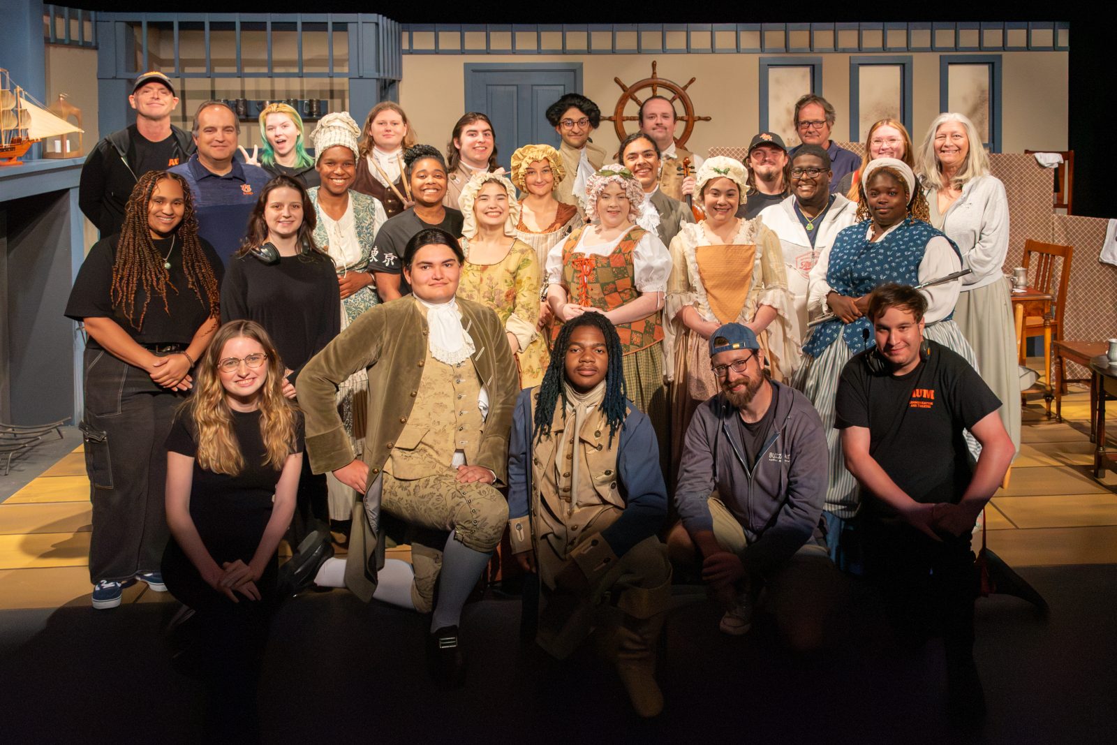 Faculty and student cast members of Theatre AUM’s “The Mercy Project” gather after a recent rehearsal.