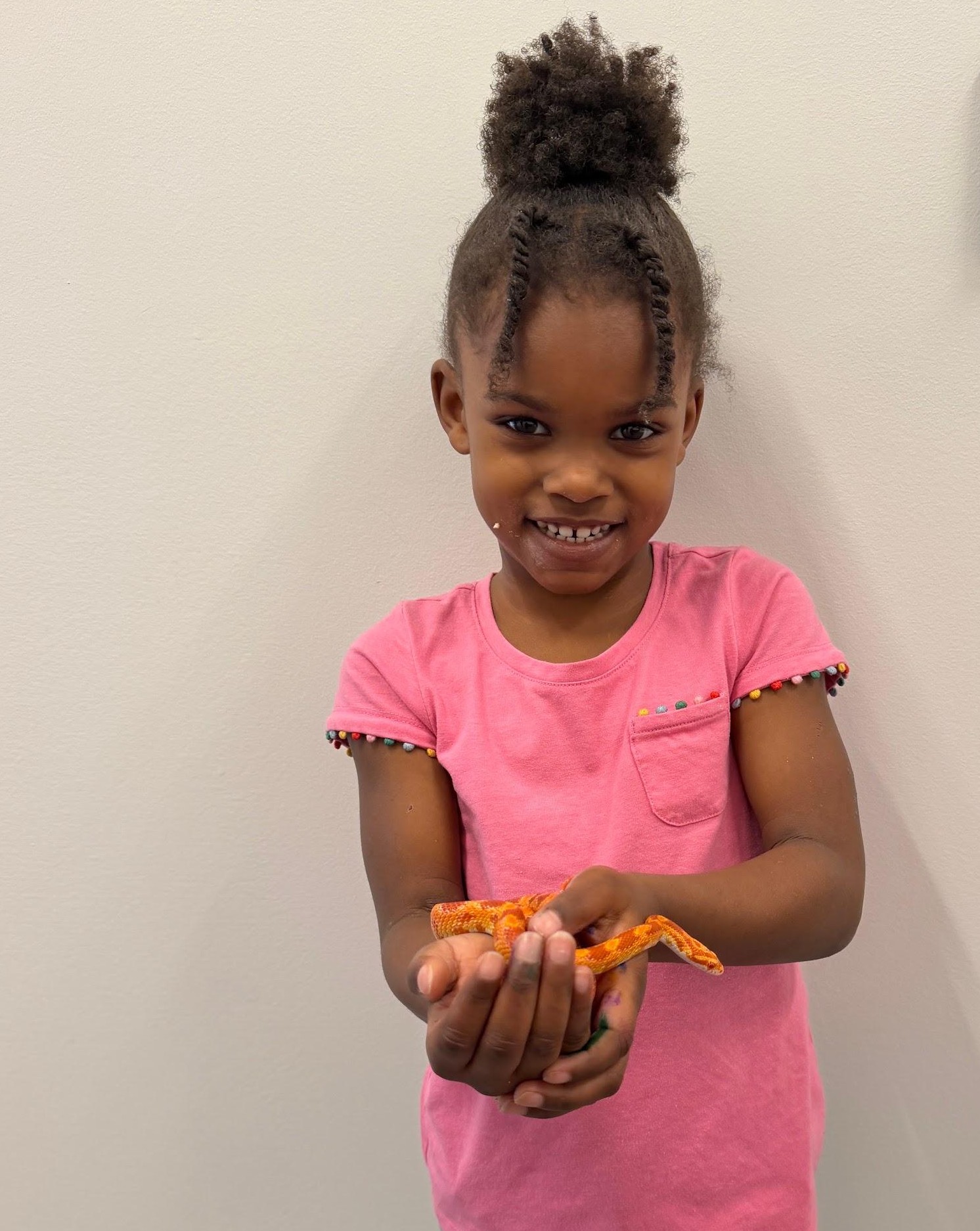 A student holding Paprika